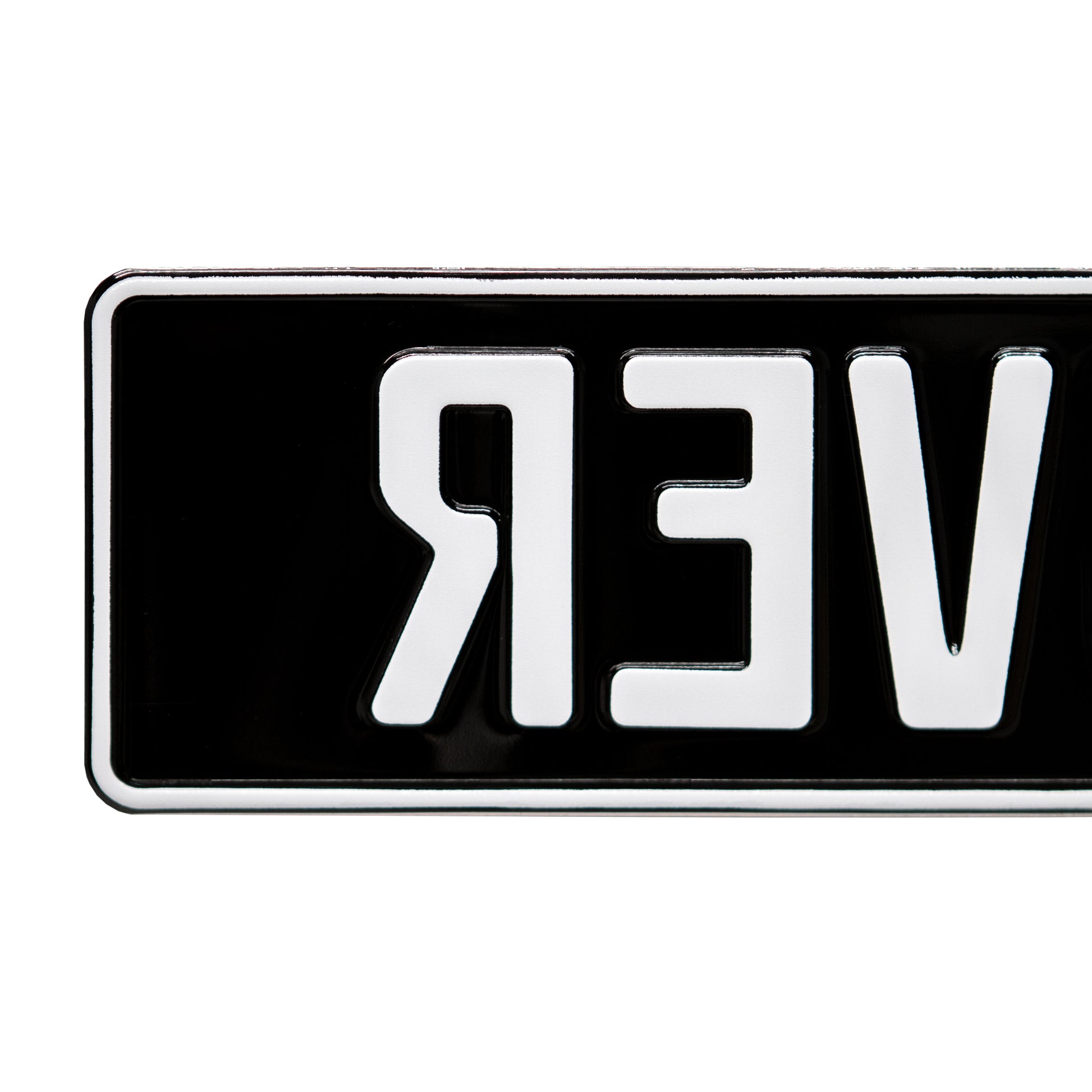 White on Gloss Black European License Plate Close Up